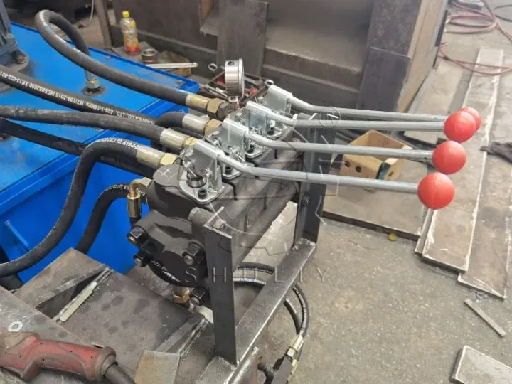 Metal baler operating handles