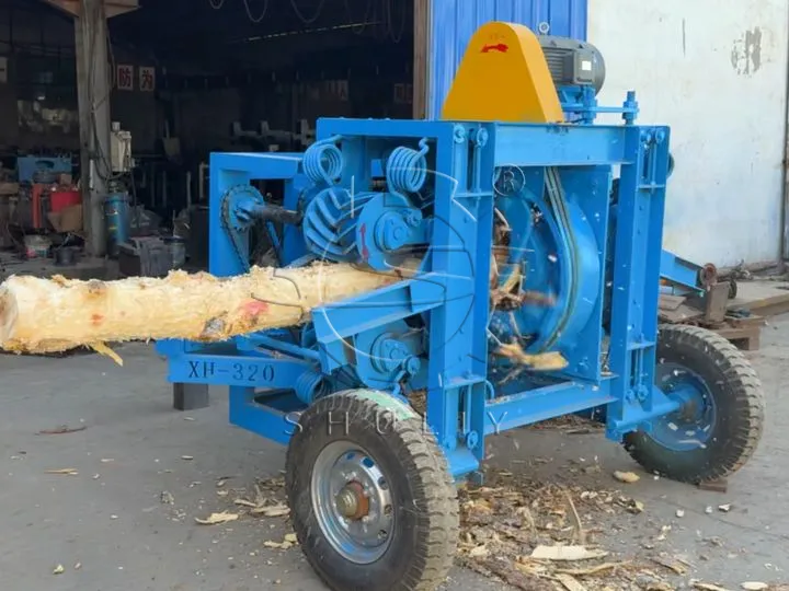 Log debarker machine with casters