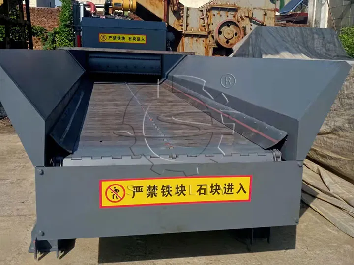 Feeding conveyor